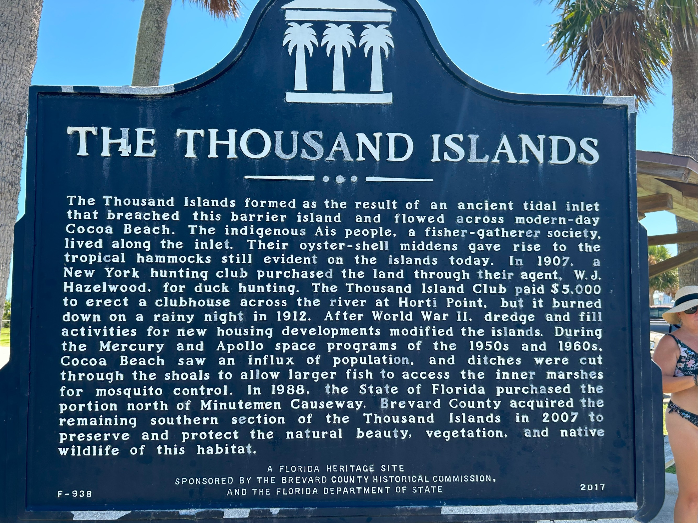 Historical marker titled 'The Thousand Islands' detailing the formation, history, and preservation of Cocoa Beach.
