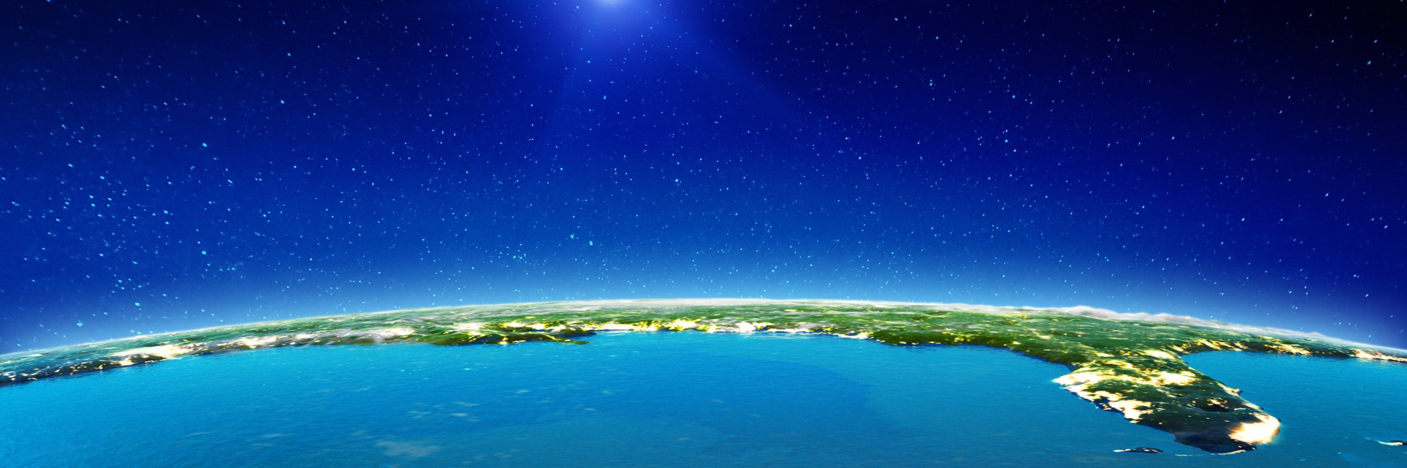 Curved view of Earth from space showing land and ocean under a starry sky.