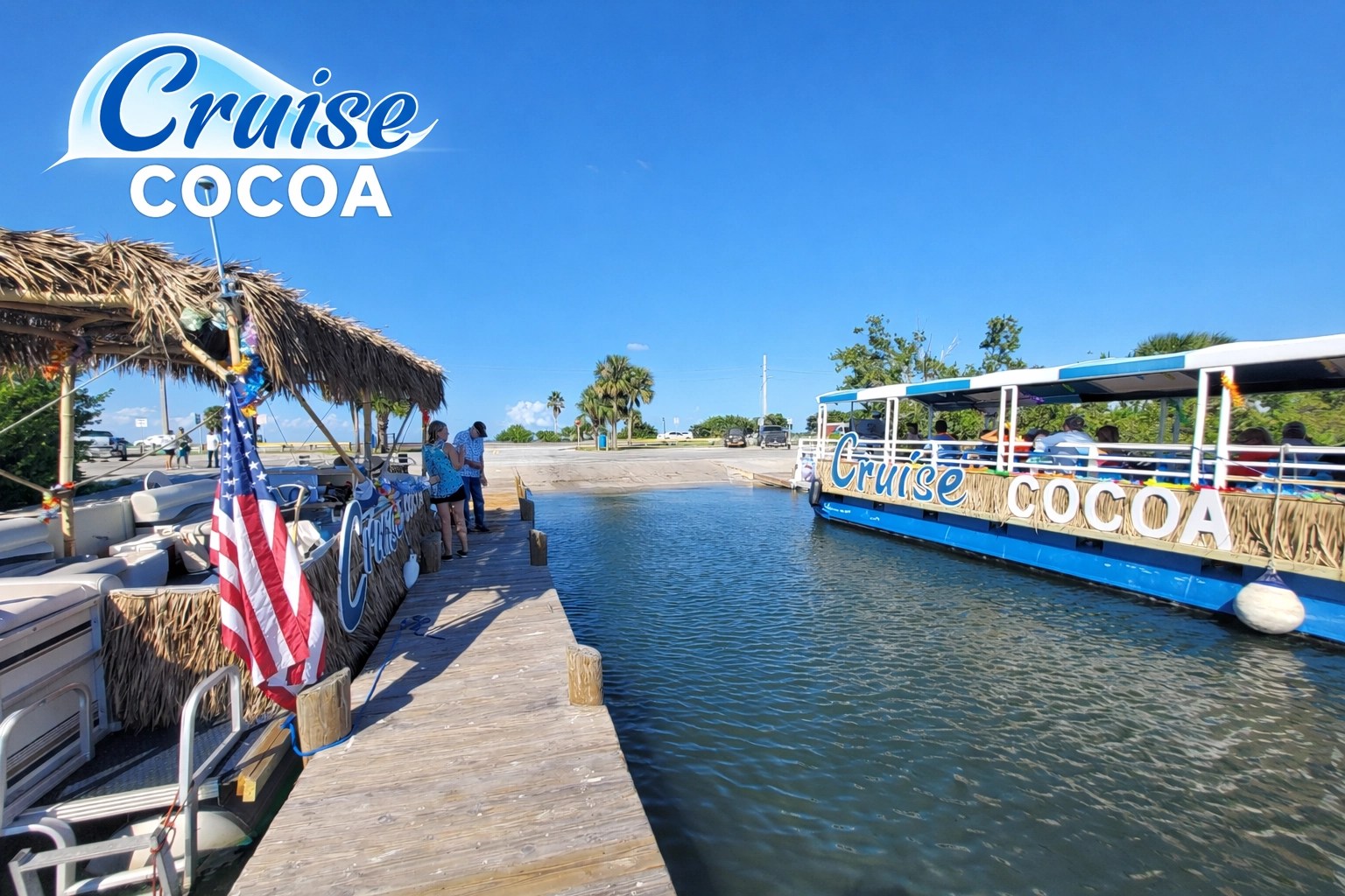 Two boats labeled 'Cruise Cocoa' docked at a wooden pier under a clear blue sky.